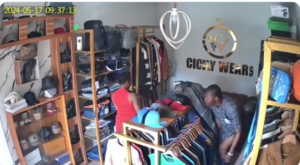 Man captured on camera smartly stealing a pair of jeans from boutique