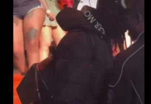 Video-Fan-gets-beaten-by-husband-of-rapper-for-touching-her-inappropriately-at-a-show.png