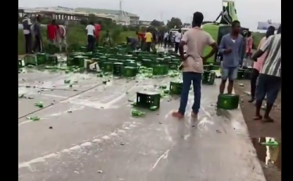 Watch-beer-spillage-on-Accra-Tema-Motorway-as-vehicle-overturns.png