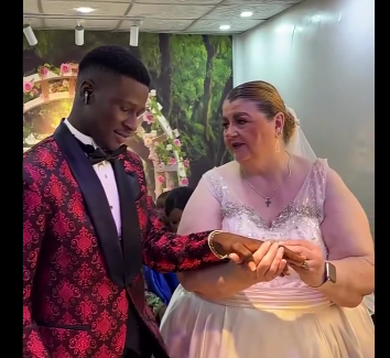 Netizens weigh in on viral video of African man marrying older White woman