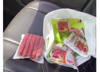 (Video) Bolt driver falls victim to sausage scam