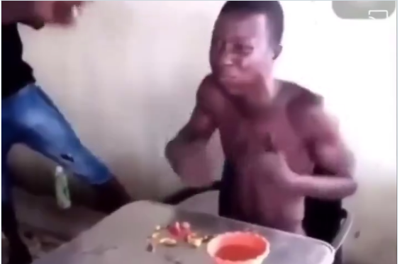 (Video) Thief forced to eat pepper and hot water as punishment