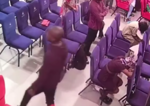 (Video) Fake usher steals new member's phone