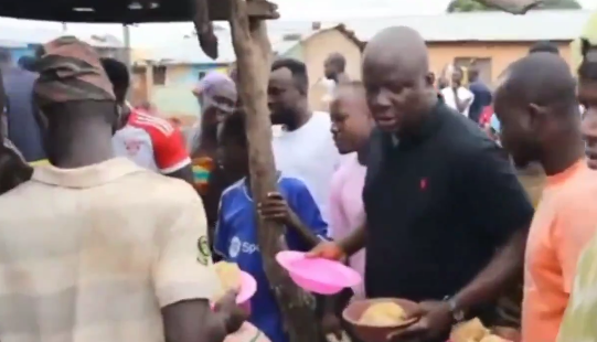 (Video) Samuel Abu Jinapor connects with constituents over kenkey and shear nuts