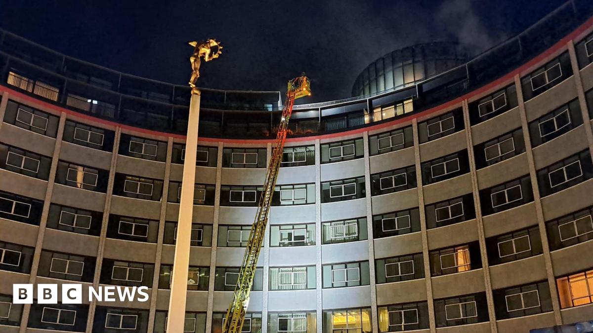100 Firefighters Battle Blaze at Nine-Storey Building