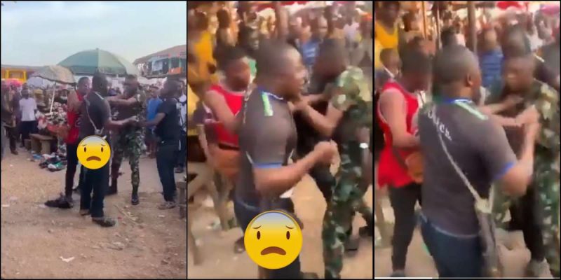 Bizarre Showdown: Watch as Nigerian Policeman and Soldier Fight in a Crowded Market!