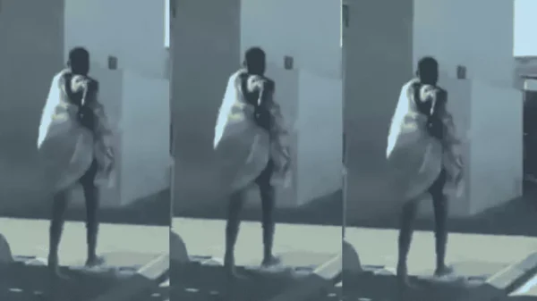 Young Man Flees Naked, Only Blanket for Cover