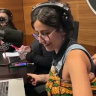 Watch: Female journalist on air effortlessly carries baby on her back while working