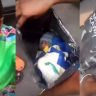 (Video) Woman Nabbed at Busy Market With Baby Concealed in Bag — Crowd in Disbelief
